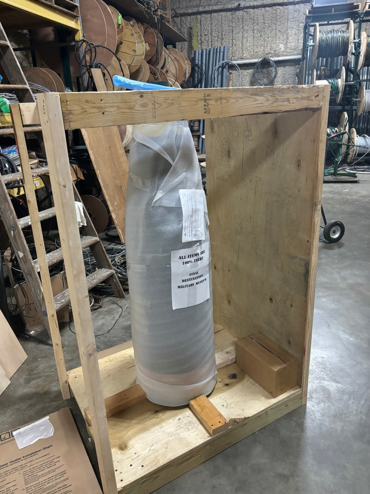16" shell in the crate
